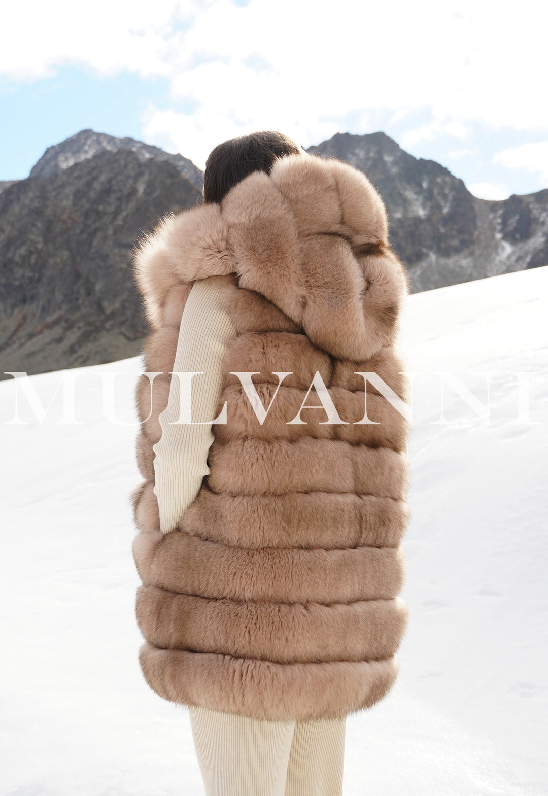 Reversible Merino Wool Parka And Fox Fur Vest, limited edition luxury designer coat in snowstorm-perfect setting.