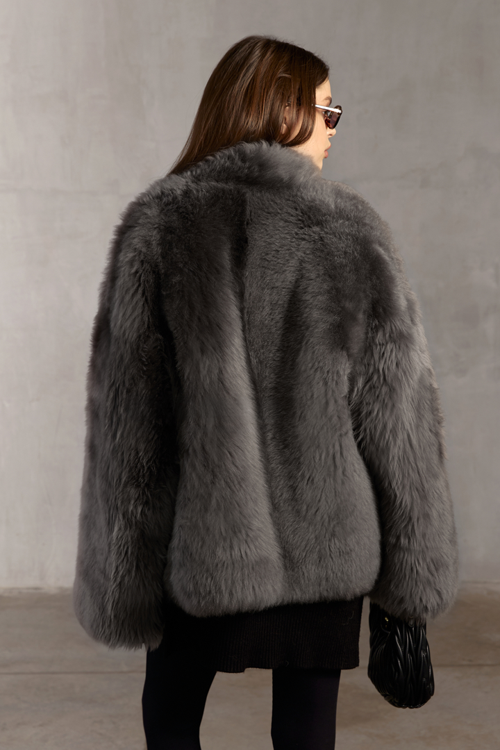 Grey shearling coat by MULVANNI — warm, elegant, and effortlessly chic.