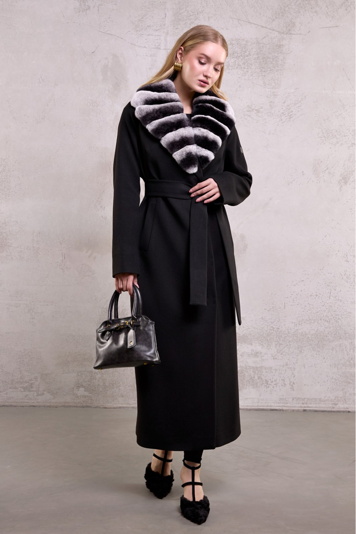 Sophisticated winter outfit featuring a black wool coat accented with ultra-soft chinchilla-toned rex rabbit fur.