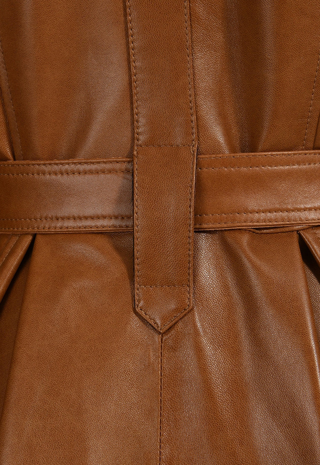 Close up of a long Brown leather trench coat with fur for women designer item. 