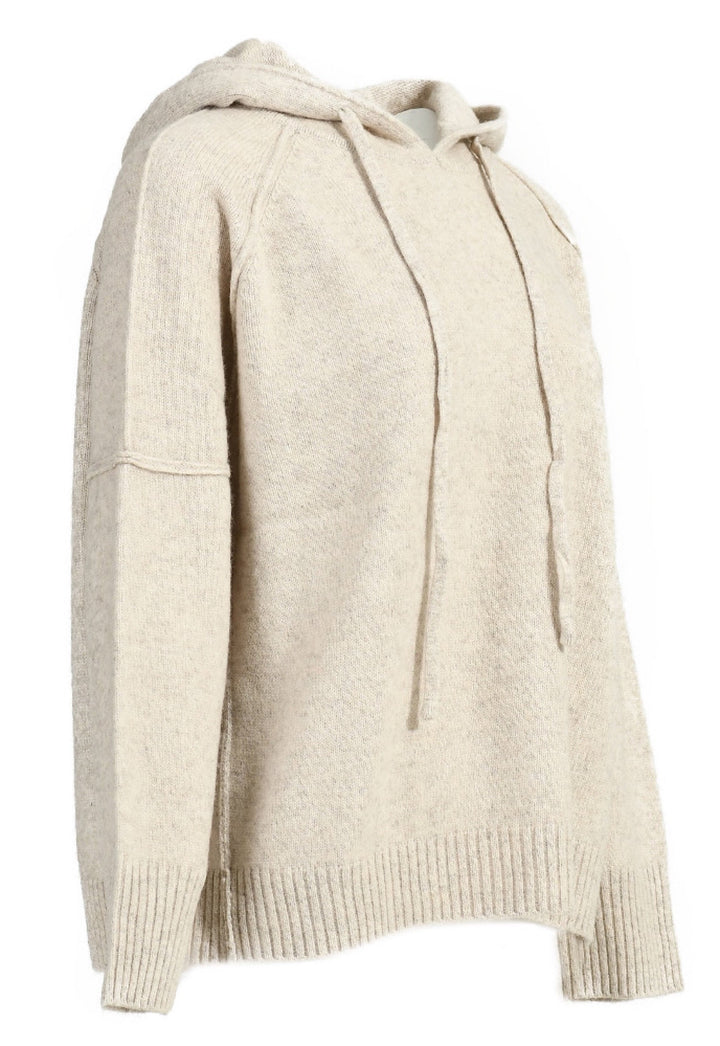A cozy cashmere hoodie crafted for ultimate comfort, featuring a relaxed silhouette that blends luxury with casual ease.