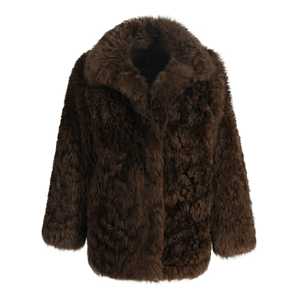 Brown shearling coat crafted from premium soft and thick shearling, offering exceptional warmth and timeless elegance for cooler weather.