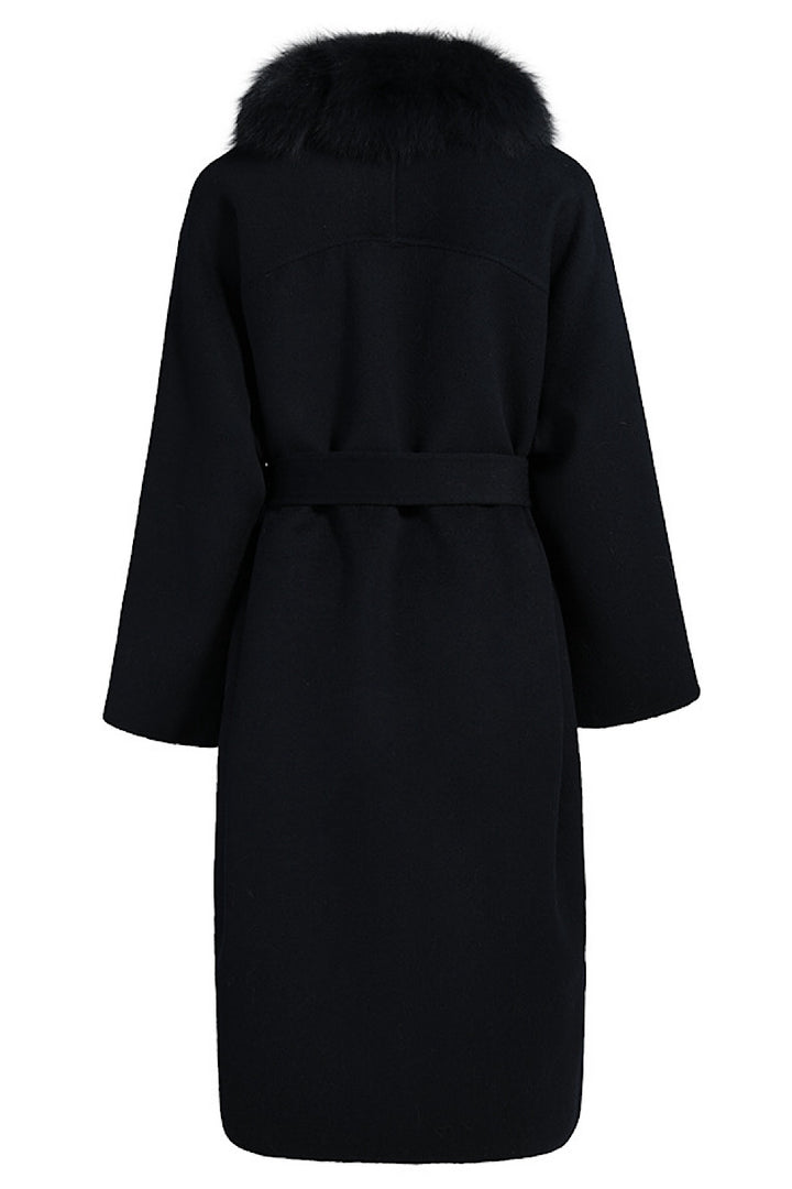 Classic black cashmere outerwear featuring a full fox fur collar, ideal for refined cold-weather style.