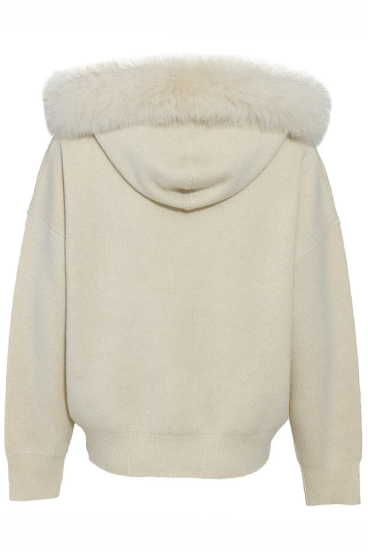 Luxurious wool-cashmere top with a laid-back silhouette and subtle ribbed finishes, designed for warmth and understated elegance.