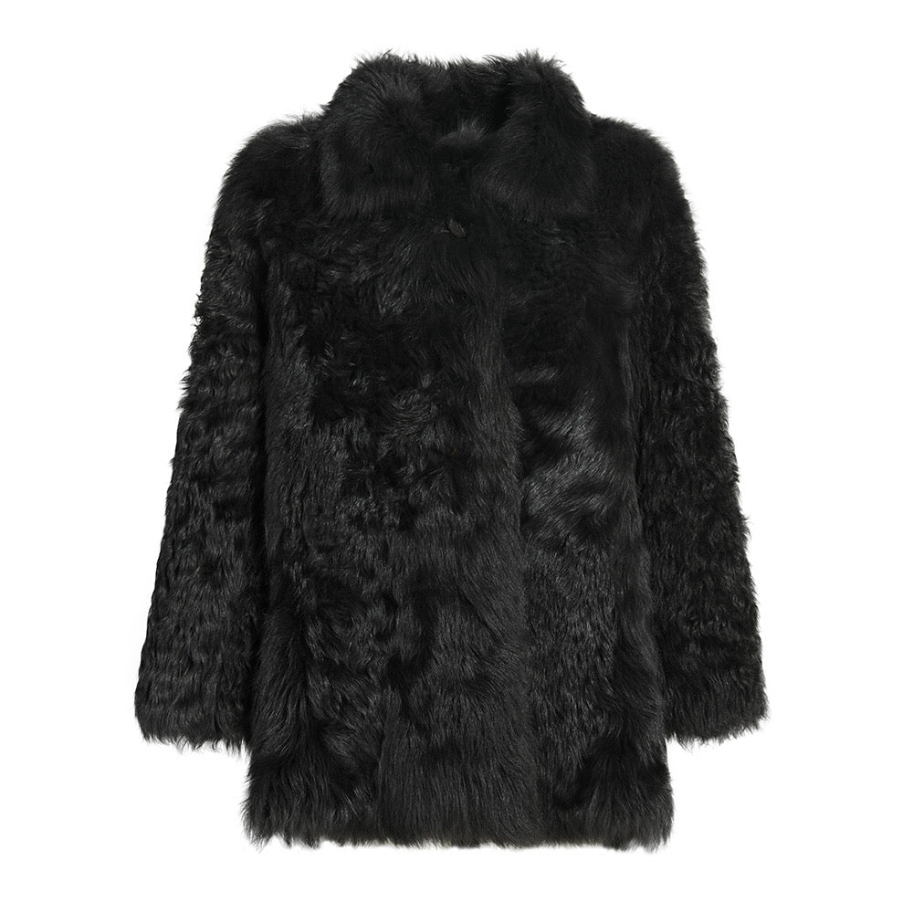 Black shearling coat from the Curve Collection, crafted from thick, soft premium shearling for exceptional warmth and a flattering fit for fuller figures.