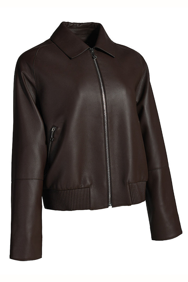 Brown leather jacket crafted from genuine leather, designed with structured tailoring and a smooth finish for a refined yet rugged look.