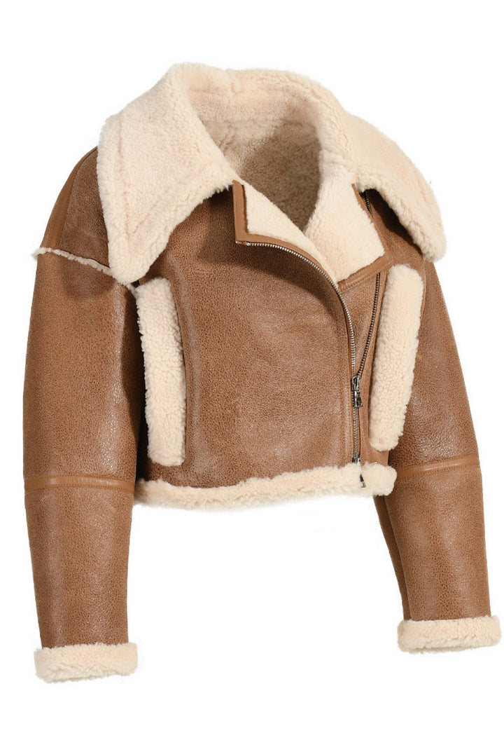 A chic cropped brown leather jacket featuring shearling trim, perfect for casual yet sophisticated layering.