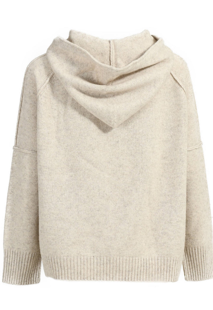 Elegant cashmere hoodie designed with a loose fit, providing warmth and softness while maintaining a stylish, laid-back look.