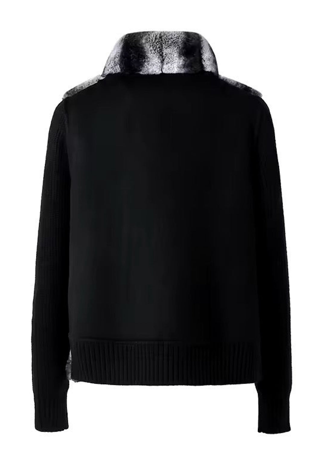 Rear angle of the black cashmere piece, showing its relaxed, refined structure and the subtle contrast of fur and fabric.