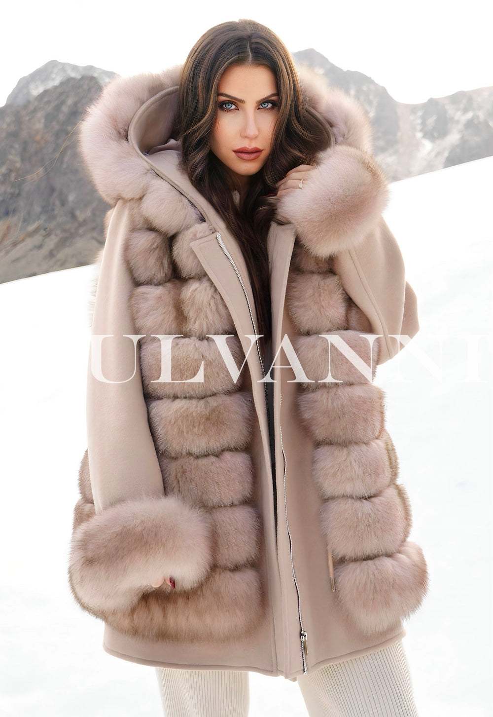 Woman wearing a Reversible Merino Wool Parka with Luxury Fox Fur Vest in snowy mountains, limited edition luxury designer coat.
