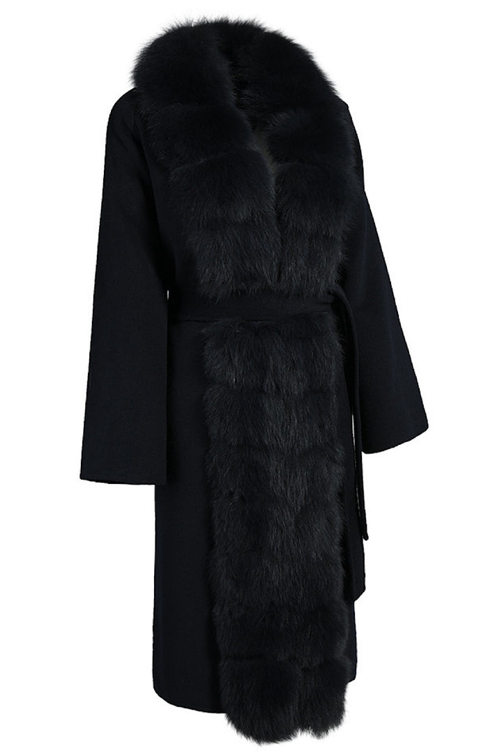 Elegant winter coat in black cashmere, finished with plush fox fur trim for added warmth and sophistication.