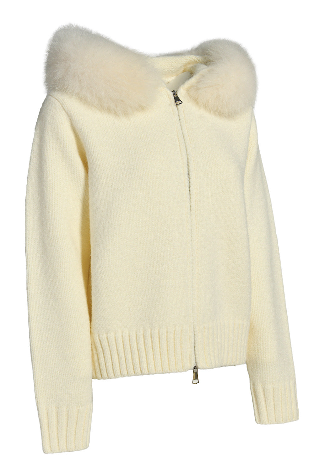 Chic ivory cashmere outerwear with matching fox fur, combining comfort and understated luxury. 