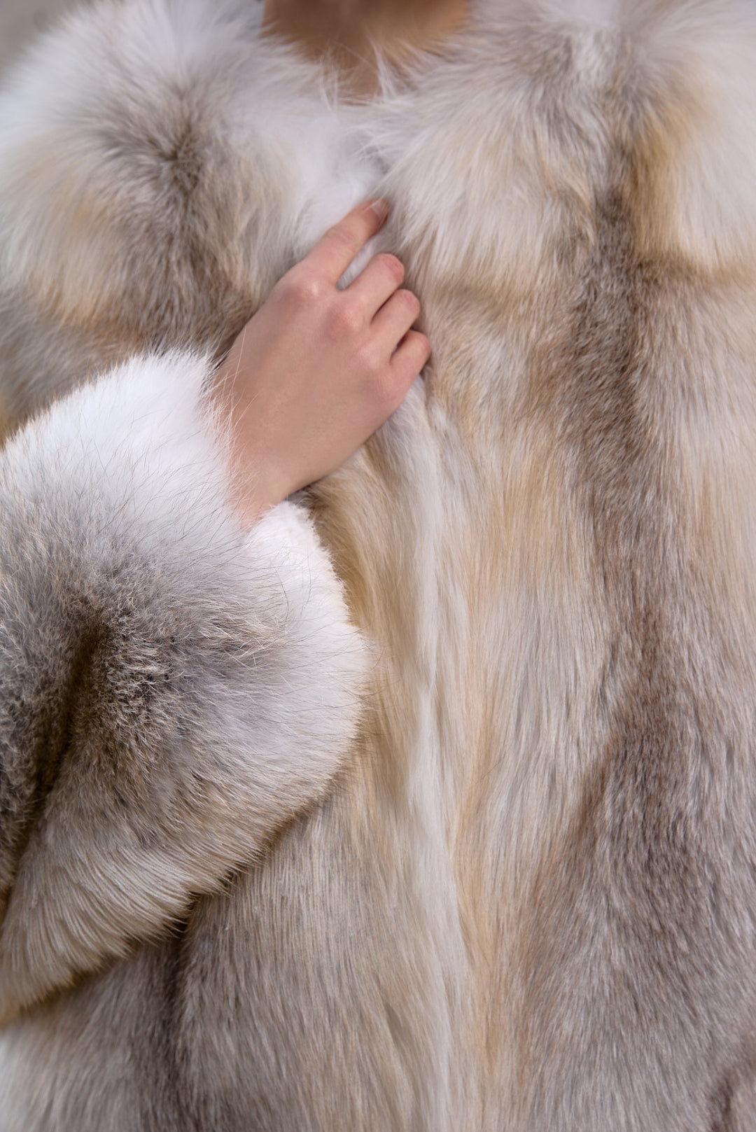 Close up of a full pelt Gold Crossed Fox Fur Coat, exuding sophistication and bold winter style, crafted for sub-zero conditions.