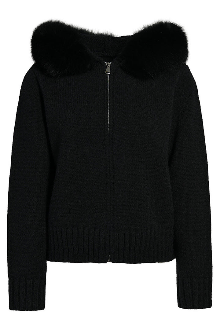 Black cashmere jacket with matching black fox fur trim, designed for elevated loungewear elegance.