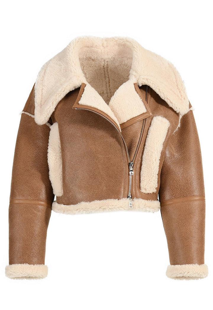 A trendy cropped brown shearling leather jacket, offering warmth and style with its soft, plush lining.
