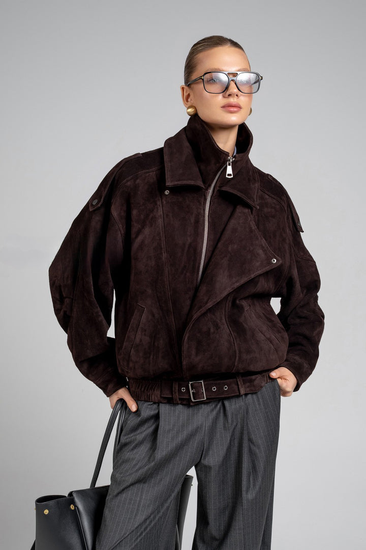 A suede jacket with a high neck and relaxed fit, combining sporty chic style with luxurious texture for effortless everyday elegance.