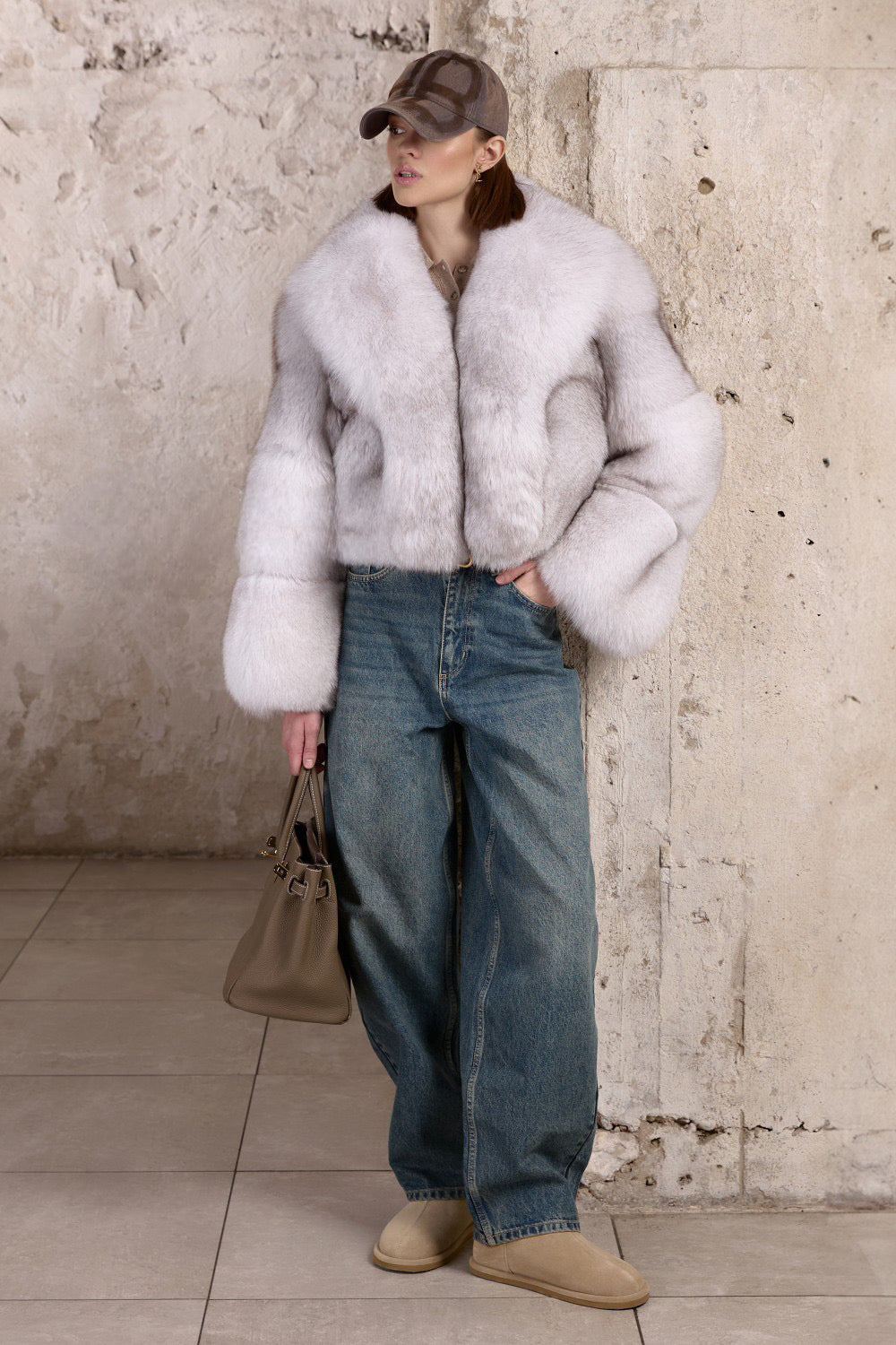 Stylishly dressed, a woman models a luxurious short Fox Fur coat crafted for comfort and built to withstand temperatures as low as -25ºC.