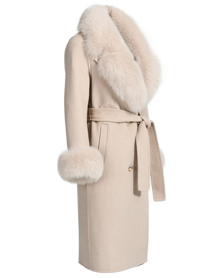 A chic beige cashmere coat, highlighted by gold button details and soft beige fox fur cuffs.