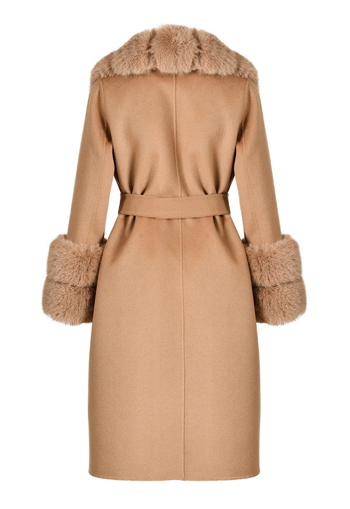 A chic camel cashmere coat with exquisite faux fur detailing, designed to keep you cozy and fashionable during the colder months.