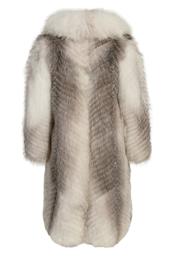 Long Arctic Crossed Marble Fox Fur coat showcasing unique fur texture and a double-breasted design with hidden closures.
