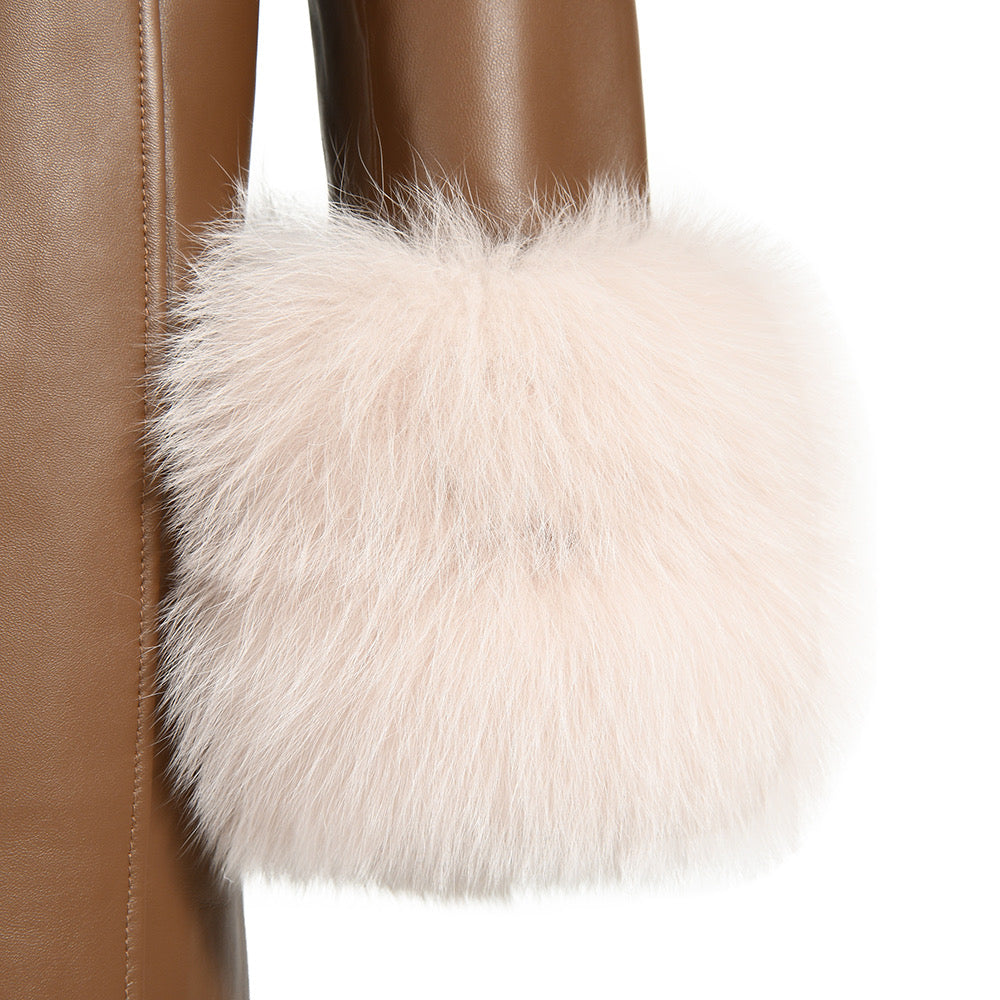 A women brown leather trench coat with fur. 