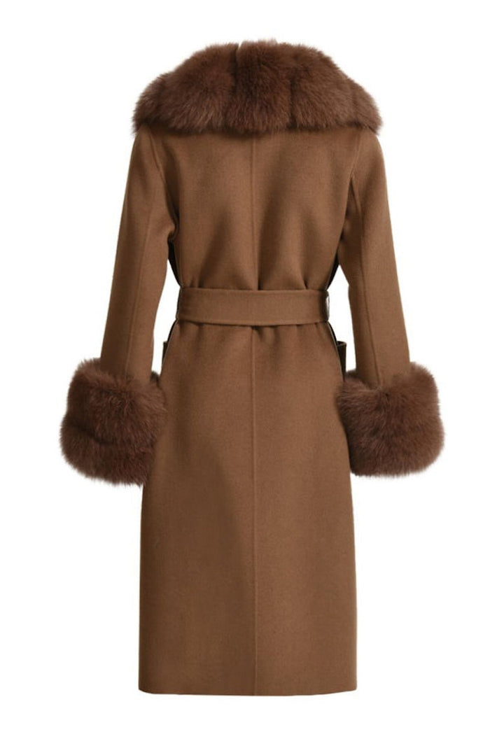 A chic brown cashmere coat with fox fur trim, combining elegance and practicality for an effortlessly refined appearance.