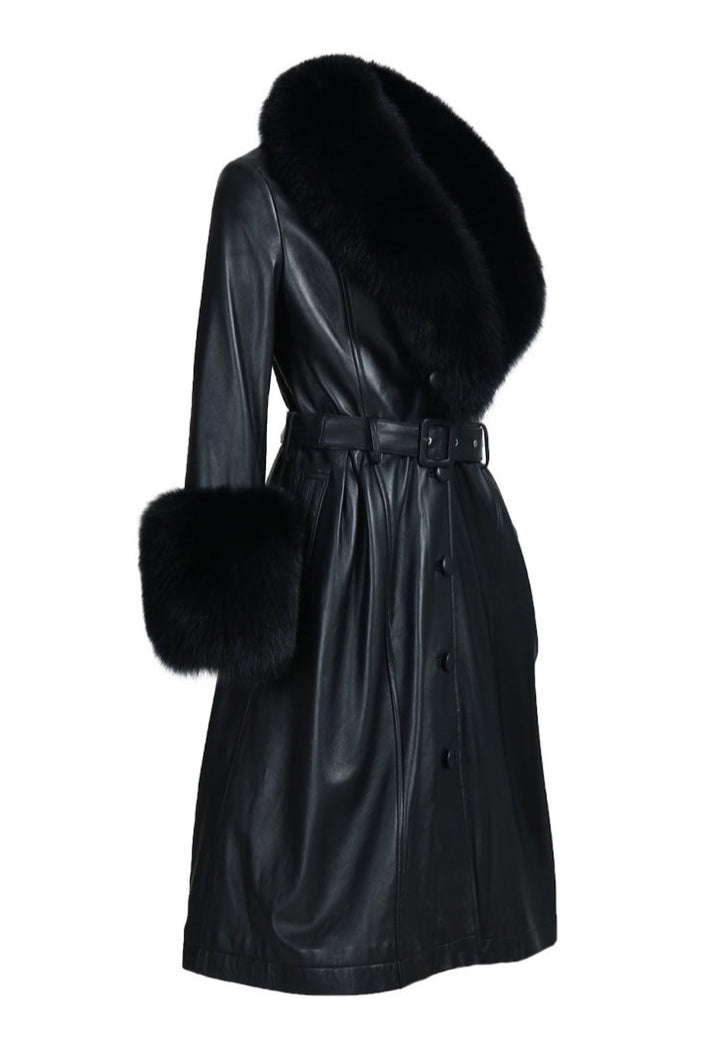 Trench in leather for woman. The combination of leather and fur adds a luxurious. 