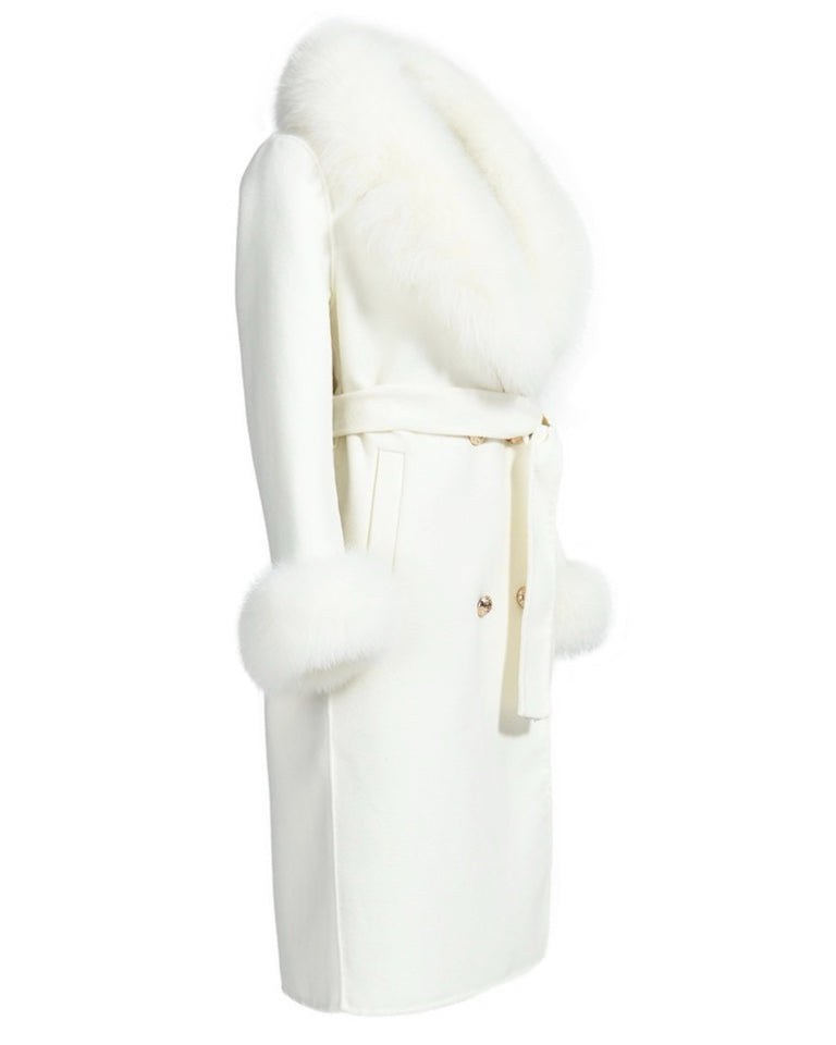 A chic white cashmere coat, highlighted by gold button details and soft beige fox fur cuffs