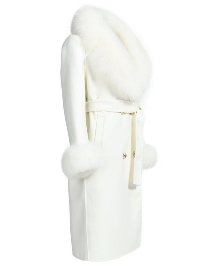 A chic white cashmere coat, highlighted by gold button details and soft beige fox fur cuffs