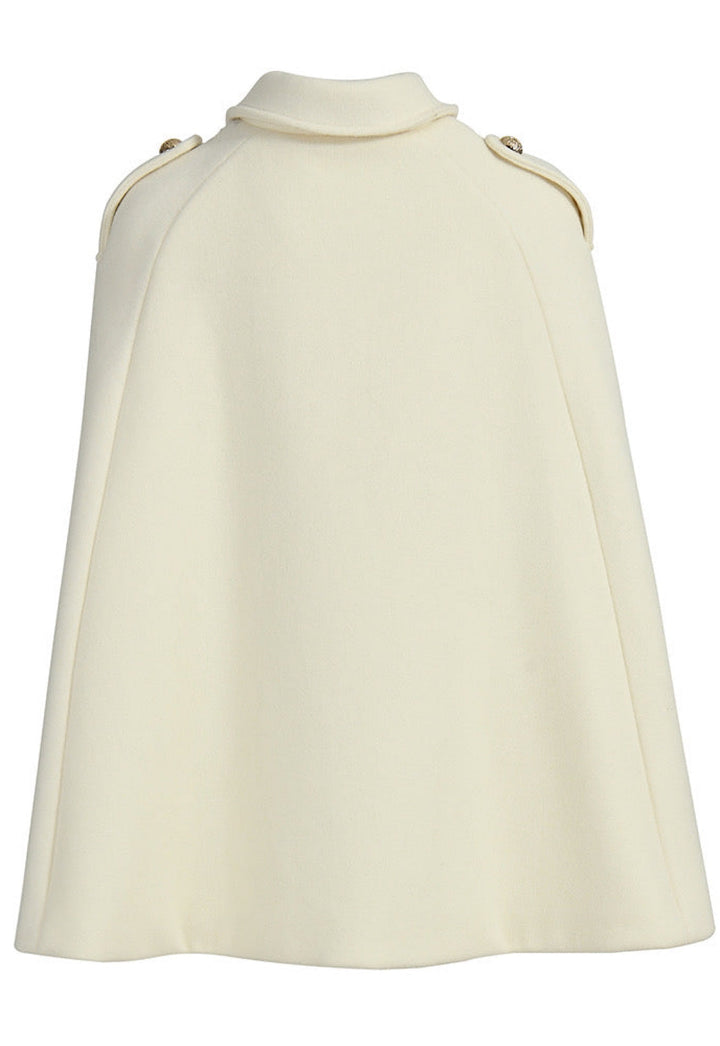 Off-white double-sided cashmere cape with gold buttons, chic cut, smart collar, and structured epaulettes, bestseller this winter.